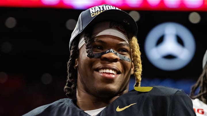 Jan 20, 2025; Atlanta, GA, USA; Ohio State Buckeyes running back Quinshon Judkins (1) celebrates after defeating the Notre Dame Fighting Irish in the CFP National Championship college football game at Mercedes-Benz Stadium. Jan 20, 2025; Atlanta, GA, USA; Ohio State Buckeyes running back Quinshon Judkins (1) celebrates after defeating the Notre Dame Fighting Irish in the CFP National Championship college football game at Mercedes-Benz Stadium.
