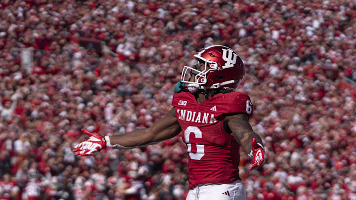 Oct 26, 2024; Bloomington, Indiana, USA; Indiana Hoosiers running back Justice Ellison (6) celebrates scoring a touchdown during the third quarter against the Washington Huskies at Memorial Stadium. Mandatory Credit: Jacob Musselman-Imagn Images
