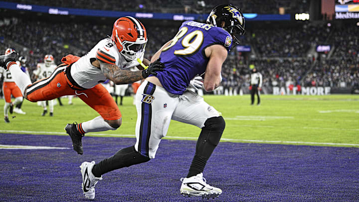 Jan 4, 2025; Baltimore, Maryland, USA; Baltimore Ravens tight end Mark Andrews (89) scores a touch down during the second quarter against Cleveland Browns safety Grant Delpit (9) at M&T Bank Stadium. Mandatory Credit: Tommy Gilligan-Imagn Images