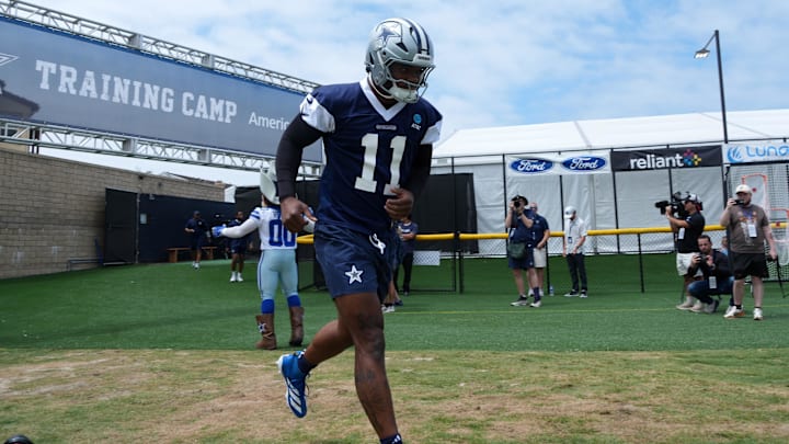 Dallas Cowboys defensive end Micah Parsons enters the field during training camp at the River Ridge Fields. 