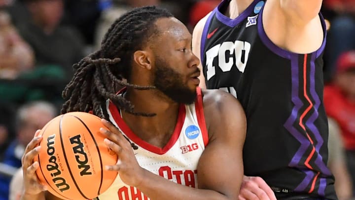 Ohio State Buckeyes guard Bruce Thornton (2) is defended by TCU Horned Frogs guard Liutauras Lelevicius (3) Thursday, March 19, 2026, during the NCAA Men’s Basketball Tournament first round game at Bon Secours Wellness Arena in Greenville, South Carolina.