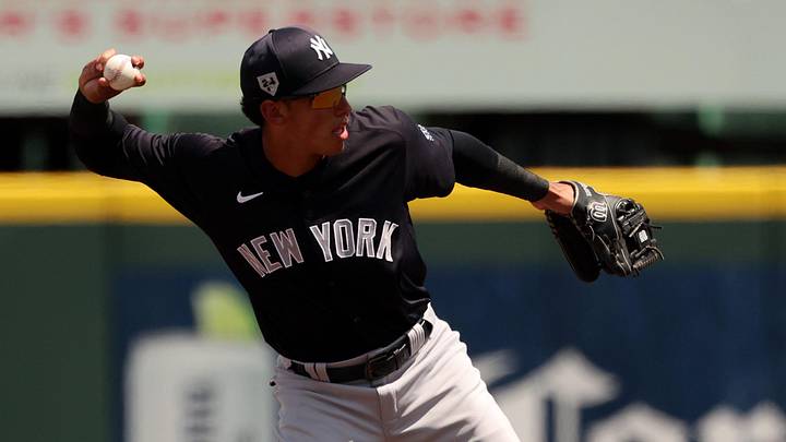 Mar 24, 2024; Bradenton, Florida, USA; New York Yankees infielder George Lombard Jr. (18) throws the ball to first base for an out during the fourth inning against the Pittsburgh Pirates at LECOM Park. Mandatory Credit: Kim Klement Neitzel-Imagn Images Mar 24, 2024; Bradenton, Florida, USA; New York Yankees infielder George Lombard Jr. (18) throws the ball to first base for an out during the fourth inning against the Pittsburgh Pirates at LECOM Park. Mandatory Credit: Kim Klement Neitzel-Imagn Images