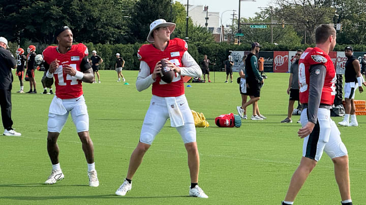 Eagles backup quarterbacks, from left to right, Dorian Thompson-Robinson, Tanner McKee, and Kyle McCord get ready to practice during training camp. Eagles backup quarterbacks, from left to right, Dorian Thompson-Robinson, Tanner McKee, and Kyle McCord get ready to practice during training camp.