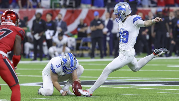 Nov 10, 2024; Houston, Texas, USA; Detroit Lions place kicker Jake Bates (39) kicks a field goal with time expiring to give the Lions a win over the Houston Texans at NRG Stadium. Bates, who attended Tomball High School, just about 30 miles North of Houston, didn't boot a single field goal as a prep or college kicker. 