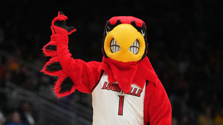 Mar 24, 2023; Seattle, WA, USA; Louisville Cardinals mascot Louie gestures against the Ole Miss Rebels in the first half at Climate Pledge Arena.