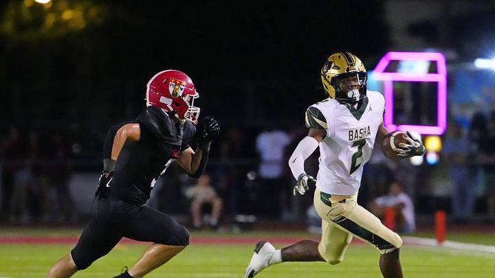 Basha wide receiver Jaden Baldwin (2) sprints after a reception against Brophy Prep during a game at Central High School in Phoenix on Aug. 28, 2025.