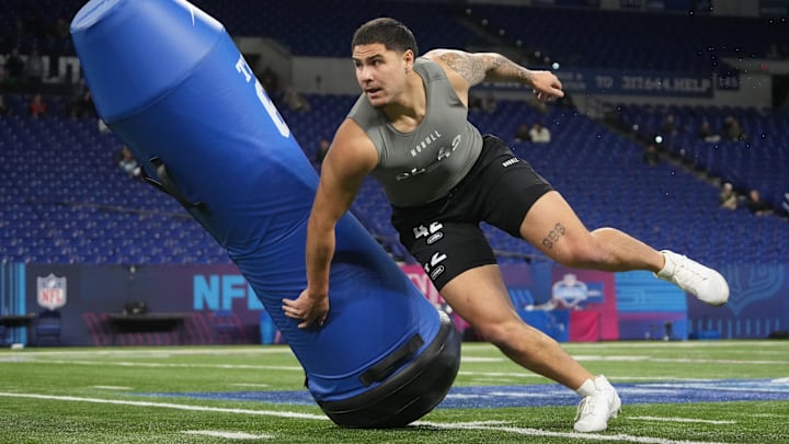 Feb 29, 2024; Indianapolis, IN, USA; UCLA defensive lineman Laiatu Latu (DL42) works out during the