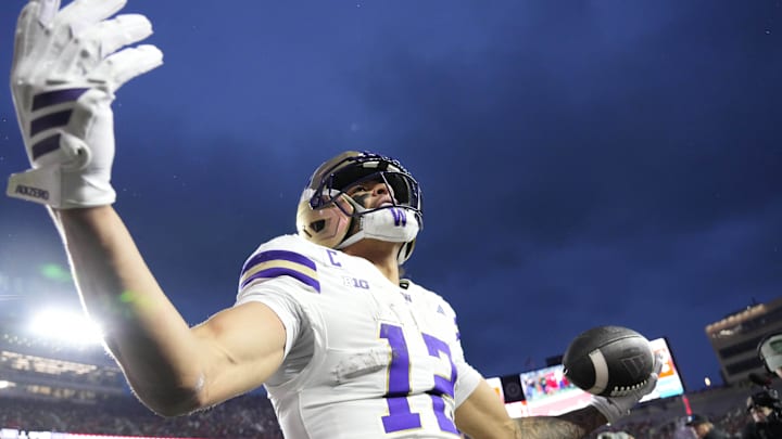 Nov 8, 2025; Madison, Wisconsin, USA;  Washington Huskies wide receiver Denzel Boston (12) celebrates after scoring a touchdown during the second quarter against the Wisconsin Badgers at Camp Randall Stadium. Mandatory Credit: Jeff Hanisch-Imagn Images