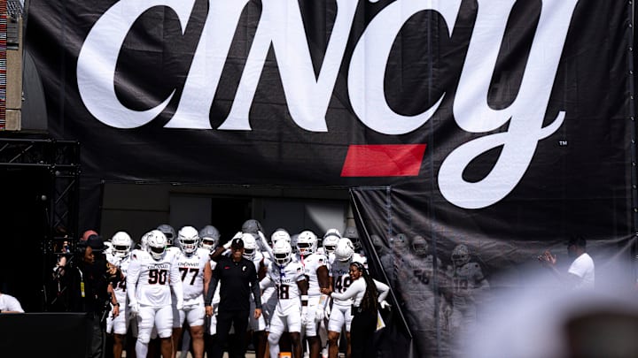 Cincinnati Bearcats head coach Scott Satterfield stands with his team before taking the field before the NCAA football game between the Cincinnati Bearcats and Bowling Green Falcons at Nippert Stadium in Cincinnati on Sept. 6, 2025. Cincinnati Bearcats head coach Scott Satterfield stands with his team before taking the field before the NCAA football game between the Cincinnati Bearcats and Bowling Green Falcons at Nippert Stadium in Cincinnati on Sept. 6, 2025.