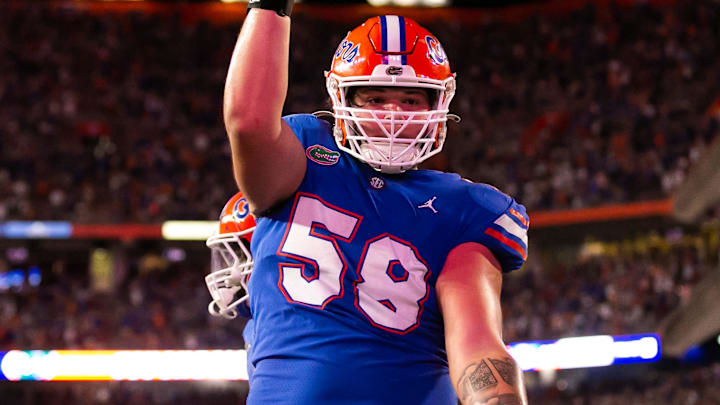 Florida Gators offensive lineman Austin Barber (58)  gives his best Gator Chomp after Florida Gators running back Montrell Johnson Jr. (2) scored the second touchdown in the first half against the LSU Tigers at Steve Spurrier Field at Ben Hill Griffin Stadium in Gainesville, FL on Saturday, October 15, 2022. [Doug Engle/Gainesville Sun]

Ncaa Football Florida Gators Vs Lsu Tigers