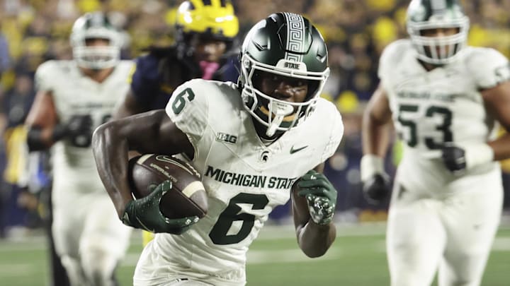 Oct 26, 2024; Ann Arbor, Michigan, USA;  Michigan State Spartans wide receiver Nick Marsh (6) runs the ball against the Michigan Wolverines at Michigan Stadium. Mandatory Credit: Rick Osentoski-Imagn Images