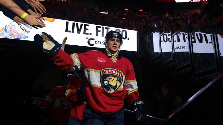 Dec 7, 2025; Sunrise, Florida, USA; Florida Panthers right wing Mackie Samoskevich (11) enters the ice during player introductions before the game against the New York Islanders at Amerant Bank Arena. Mandatory Credit: Sam Navarro-Imagn Images Dec 7, 2025; Sunrise, Florida, USA; Florida Panthers right wing Mackie Samoskevich (11) enters the ice during player introductions before the game against the New York Islanders at Amerant Bank Arena. Mandatory Credit: Sam Navarro-Imagn Images