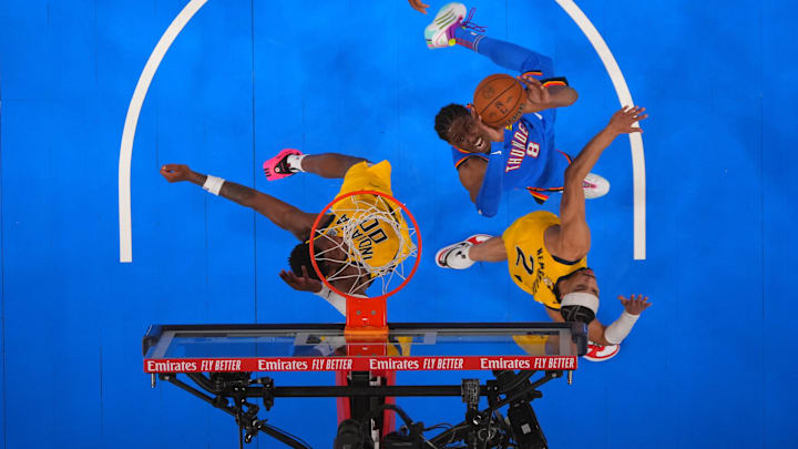Jun 22, 2025; Oklahoma City, Oklahoma, USA; Oklahoma City Thunder forward Jalen Williams (8) shoots against Indiana Pacers guard Bennedict Mathurin (00) and guard Andrew Nembhard (2) during the second half during game seven of the 2025 NBA Finals at Paycom Center. Mandatory Credit: Julio Cortez-Pool Photo via Imagn Images