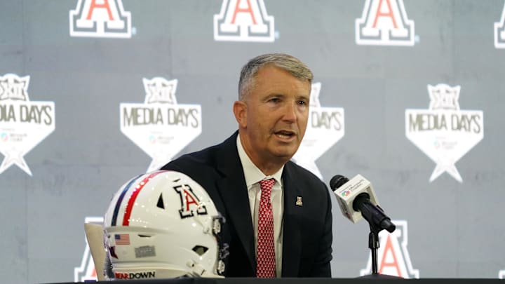 Jul 9, 2025; Frisco, TX, USA; Arizona head coach Brent Brennan speaks with the media during 2025 Big 12 Football Media Days at The Star. Mandatory Credit: Raymond Carlin III-Imagn Images Jul 9, 2025; Frisco, TX, USA; Arizona head coach Brent Brennan speaks with the media during 2025 Big 12 Football Media Days at The Star. Mandatory Credit: Raymond Carlin III-Imagn Images