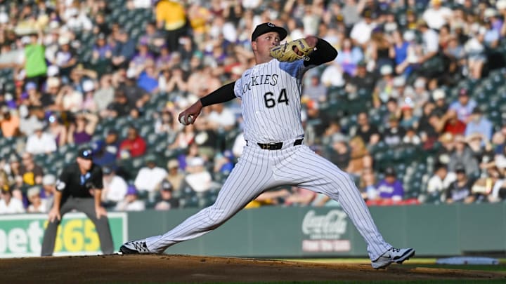 May 10, 2025; Denver, Colorado, USA; Colorado Rockies pitcher Bradley Blalock (64) delivers a pitch in at the first inning agains the San Diego Padres at Coors Field. Mandatory Credit: John Leyba-Imagn Images