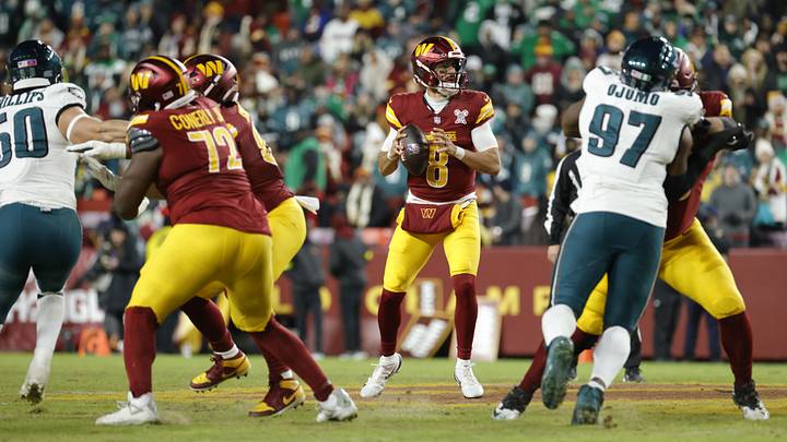 Dec 20, 2025; Landover, Maryland, USA; Washington Commanders quarterback Marcus Mariota (8) looks to pass against the Philadelphia Eagles, while linemen Laremy Tunsil and Josh Conerly Jr. hold the edges during the second half at Northwest Stadium. Mandatory Credit: Amber Searls-Imagn Images Dec 20, 2025; Landover, Maryland, USA; Washington Commanders quarterback Marcus Mariota (8) looks to pass against the Philadelphia Eagles, while linemen Laremy Tunsil and Josh Conerly Jr. hold the edges during the second half at Northwest Stadium. Mandatory Credit: Amber Searls-Imagn Images