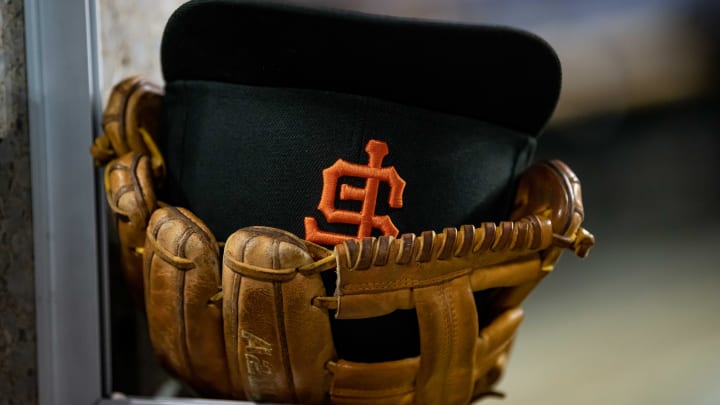 Aug 23, 2022; Detroit, Michigan, USA; The hat and glove of San Francisco Giants third baseman Evan Longoria (10) sits on the edge of the dugout steps during their game against the Detroit Tigers at Comerica Park. Aug 23, 2022; Detroit, Michigan, USA; The hat and glove of San Francisco Giants third baseman Evan Longoria (10) sits on the edge of the dugout steps during their game against the Detroit Tigers at Comerica Park.