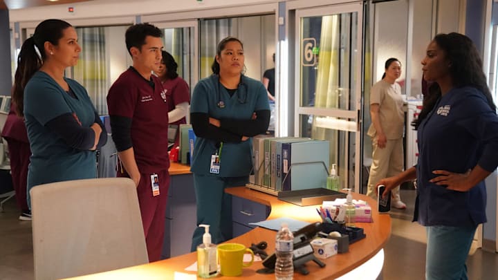 CHICAGO MED -- "No Love Lost" Episode 1009 -- Pictured: (l-r) Lorena Diaz as Nurse Doris, Darren Barnet as Dr. John Frost, Marie Tredway as Nurse Trini, Marlyne Barrett as Maggie Lockwood