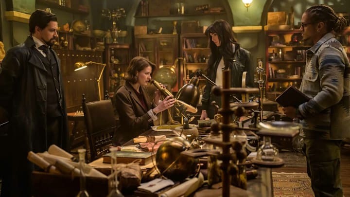 The Librarians: The Next Chapter -- Image Number: LIB102_0209r -- Pictured (L-R): Callum McGowan as Vikram Chamberlain, Olivia Morris as Lysa Pascal, Jessica Green as Charlie Cornwall, and Bluey Robinson as Connor Green -- Photo: Aleksandar Letic/The CW -- © 2024 The CW Network, LLC. All Rights Reserved.