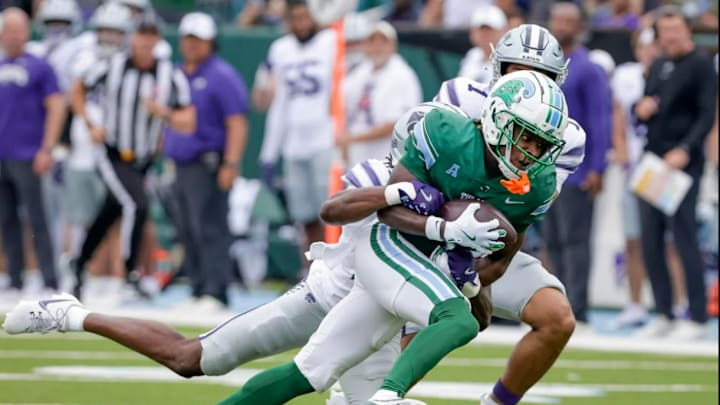 Tulane wide receiver Mario Williams (4) makes a long pass reception against Kansas State during the second half of an NCAA football game at Yulman Stadium in New Orleans, Saturday, Sept. 7, 2024.