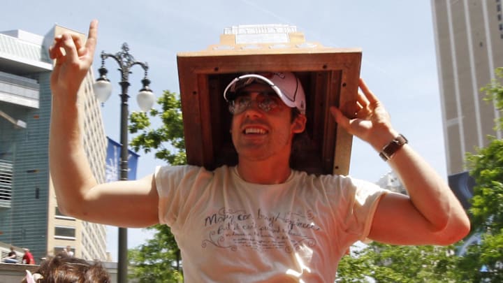 June 6, 2008; Detroit, MI, USA; Detroit Red Wings player Henrik Zetterberg (40) holds the Conn Smythe trophy for MVP honors during the Stanley Cup championship victory parade. Mandatory Credit: Leon Halip-Imagn Images