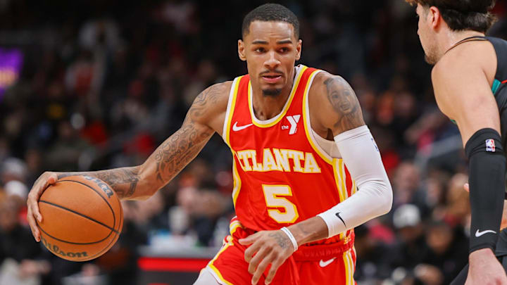 Jan 13, 2024; Atlanta, Georgia, USA; Atlanta Hawks guard Dejounte Murray (5) drives to the basket