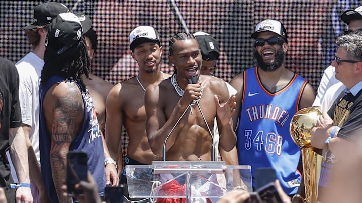 Jun 24, 2025; Oklahoma City, OK, USA; Oklahoma City Thunder guard Shai Gilgeous-Alexander speaks to fans during the Oklahoma City Thunder Champions parade. Center. Mandatory Credit: Alonzo Adams-Imagn Images