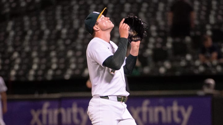 Jul 2, 2024; Oakland, California, USA; Oakland Athletics pitcher Mason Miller (19) points to the sky.