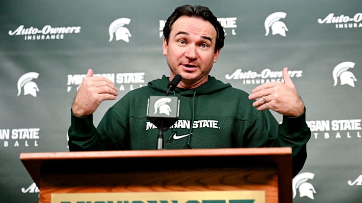 Michigan State coach Jonathan Smith talks the media on the first national signing day for college