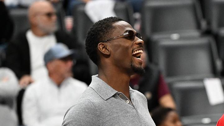 Oct 5, 2026; Detroit, Michigan, USA;  Detroit Pistons center Jalen Duren (left) and Detroit Pistons forward Duncan Robinson (55) share a laugh on the bench during the Pistons' game against the Phoenix Suns in the third quarter at Little Caesars Arena.  Mandatory Credit: Lon Horwedel-Imagn Images
