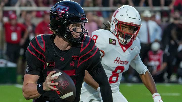 Texas Tech's Will Hammond rolls out for the pass against Houston during a Big 12 Conference football game, Friday, Sept. 18, 2026, at Galaxy Stadium. Texas Tech's Will Hammond rolls out for the pass against Houston during a Big 12 Conference football game, Friday, Sept. 18, 2026, at Galaxy Stadium.