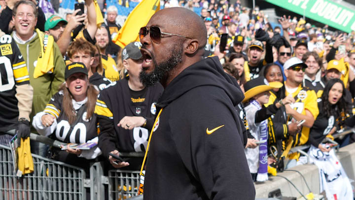 Sep 28, 2025; Dublin, Ireland; Pittsburgh Steelers coach Mike Tomlin interacts with fans during an NFL International Series game against the Minnesota Vikings at Croke Park. 