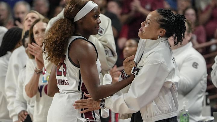 South Carolina Coach Dawn Staley greets South Carolina guard Raven Johnson (25) coming out of the game against University of Southern California Monday, March 23, 2026, during the fourth quarter NCAA Women's Basketball Tournament at Colonial Life Arena in Columbia, South Carolina.