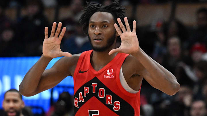 Feb 1, 2026; Toronto, Ontario, CAN; Toronto Raptors guard Immanuel Quickley (5) reacts after making a three point basket against the Utah Jazz in the second half at Scotiabank Arena. Mandatory Credit: Dan Hamilton-Imagn Images