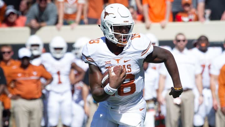 Texas Longhorns quarterback Tyrone Swoopes (18) runs the ball for a touchdown against the Oklahoma State Cowboys during the first half at Boone Pickens Stadium. Texas Longhorns quarterback Tyrone Swoopes (18) runs the ball for a touchdown against the Oklahoma State Cowboys during the first half at Boone Pickens Stadium.