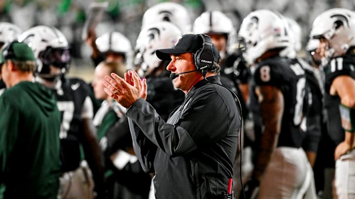 Michigan State's head coach Jonathan Smith claps while looking on during the second overtime in the game against Boston College on Saturday, Sept. 6, 2025, at Spartan Stadium in East Lansing.