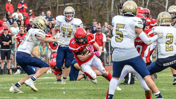 CVU's Alex Provost gets some yards after the catch during the Redhawks' D1 football semifinal vs the Essex Hornets on Saturday afternoon in Hinesburg

D1 Football Semifinal Essex At Cvu 05nov22 9014