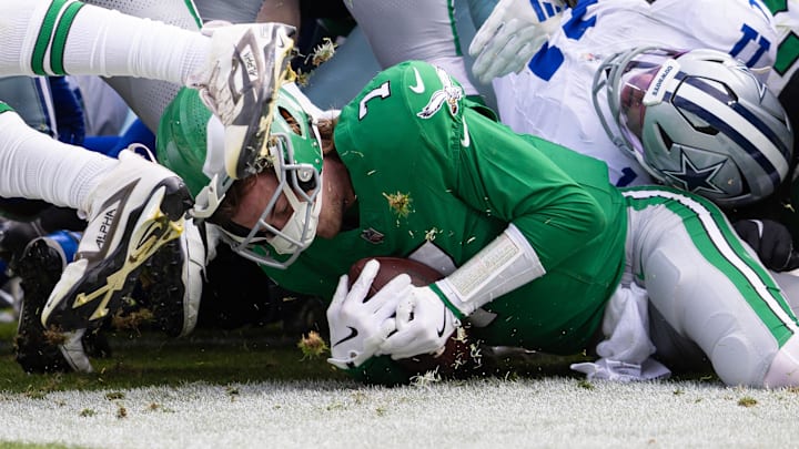 Philadelphia Eagles quarterback Kenny Pickett scores a touchdown against the Dallas Cowboys.
