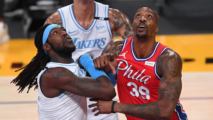 Mar 25, 2021; Los Angeles, California, USA;  Los Angeles Lakers center Montrezl Harrell (15) and Philadelphia 76ers center Dwight Howard (39) battle for position on the court in the first half of the game at Staples Center. Mandatory Credit: Jayne Kamin-Oncea-Imagn Images