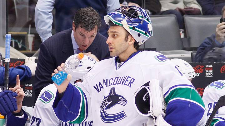 Feb 8, 2014; Toronto, Ontario, CAN; Vancouver Canucks Goalies Roberto Luongo (1) during a break in the action against the Toronto Maple Leafs at the Air Canada Centre. Toronto defeated Vancouver 3-1. Mandatory Credit: John E. Sokolowski-USA TODAY Sports Feb 8, 2014; Toronto, Ontario, CAN; Vancouver Canucks Goalies Roberto Luongo (1) during a break in the action against the Toronto Maple Leafs at the Air Canada Centre. Toronto defeated Vancouver 3-1. Mandatory Credit: John E. Sokolowski-USA TODAY Sports