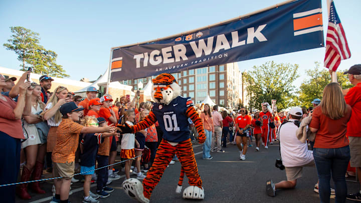 Aubie greets fans during Tiger Walk before Auburn Tigers take on Georgia Bulldogs at Jordan-Hare Stadium in Auburn, Ala. on Saturday, Oct. 11, 2025. Aubie greets fans during Tiger Walk before Auburn Tigers take on Georgia Bulldogs at Jordan-Hare Stadium in Auburn, Ala. on Saturday, Oct. 11, 2025.