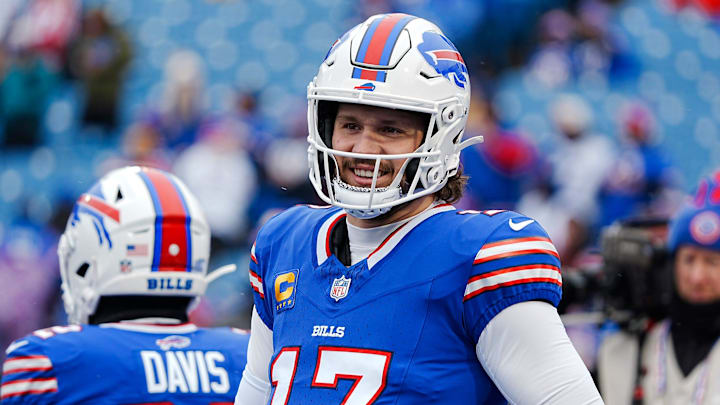 Buffalo Bills quarterback Josh Allen (17) smiles at something someone said before the Buffalo Bills wild card game against the Denver Broncos at Highmark Stadium in Orchard Park on Jan. 12, 2025.