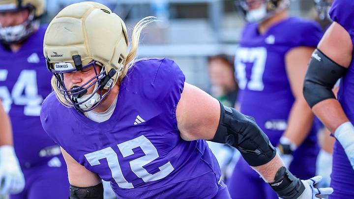 Husky offensive guard John Mills continues to receive preseason attention. Husky offensive guard John Mills continues to receive preseason attention.