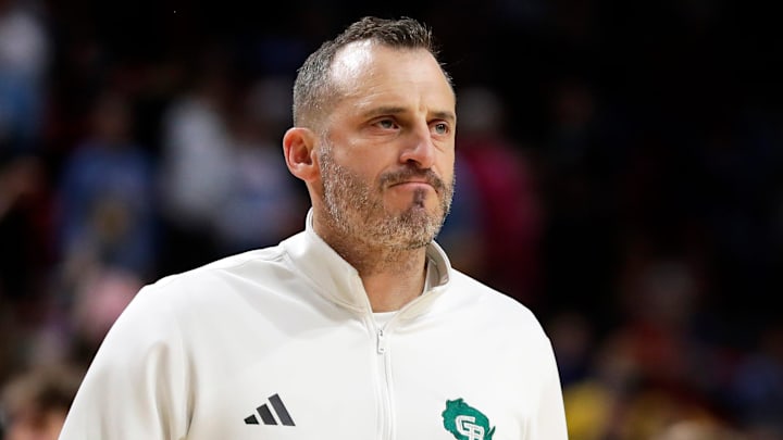 Doug Gottlieb, Green Bay men's basketball head coach, walks off the court after the team's 72-70 loss to Michigan Tech on Wednesday, Dec. 18, 2024, at the Resch Center in Ashwaubenon, Wisconsin.