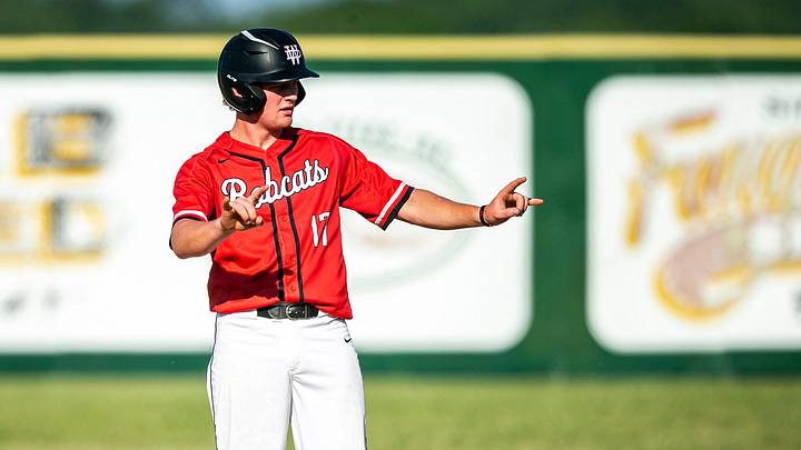 Western Dubuque's Brett Harris reacts after hitting a double during a high school baseball game against Cedar Rapids Kennedy, Tuesday, May 30, 2023, at Farley Community Park in Farley, Iowa. Western Dubuque's Brett Harris reacts after hitting a double during a high school baseball game against Cedar Rapids Kennedy, Tuesday, May 30, 2023, at Farley Community Park in Farley, Iowa.