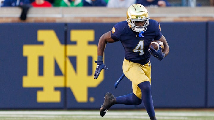 Notre Dame running back Jeremiyah Love runs with the ball in the second half of a NCAA football game against NC State at Notre Dame Stadium on Saturday, Oct. 11, 2025, in South Bend. Notre Dame running back Jeremiyah Love runs with the ball in the second half of a NCAA football game against NC State at Notre Dame Stadium on Saturday, Oct. 11, 2025, in South Bend.