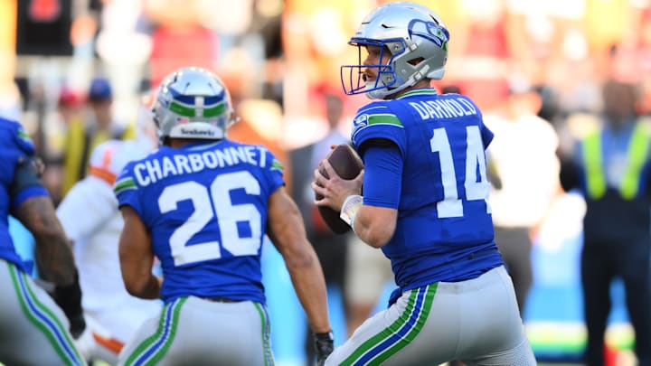 Oct 5, 2025; Seattle, Washington, USA; Seattle Seahawks quarterback Sam Darnold (14) stands in the pocket against the Tampa Bay Buccaneers during the second half at Lumen Field.