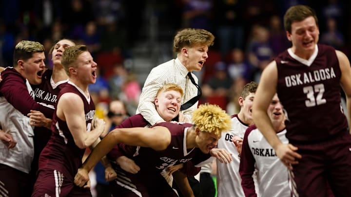 Oskaloosa celebrates its 48-44 win over Norwalk to win the boys 3A state basketball championship game on Friday, March 8, 2019 in Des Moines.

0308 3ambb 25 Jpg