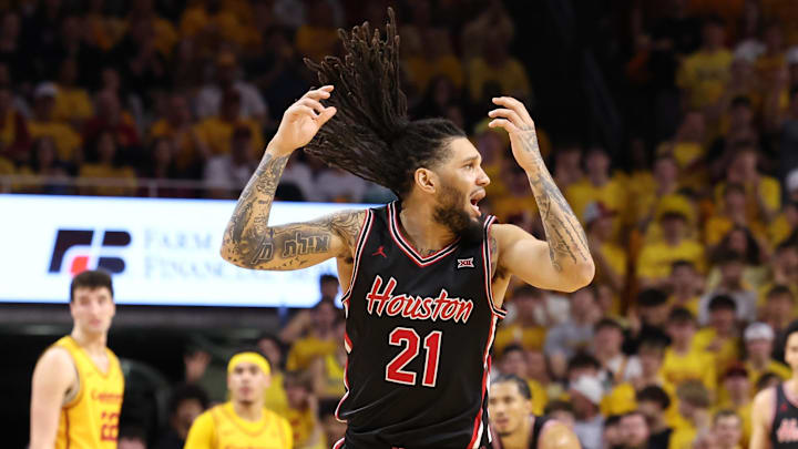 Feb 16, 2026; Ames, Iowa, USA;  Houston Cougars guard Emanuel Sharp (21) reacts to a call by the officials in their game with the Iowa State Cyclones during the second half at James H. Hilton Coliseum. Mandatory Credit: Reese Strickland-Imagn Images
