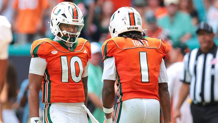 Oct 24, 2026; Miami Gardens, Florida, USA; Miami Hurricanes wide receiver Malachi Toney (1) celebrates with quarterback Darian Mensah (10) after scoring a touchdown against the Pittsburgh Panthers during the second quarter at Hard Rock Stadium. Mandatory Credit: Sam Navarro-Imagn Images